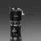 Black camping stove with visible Firemaple branding on a gray background