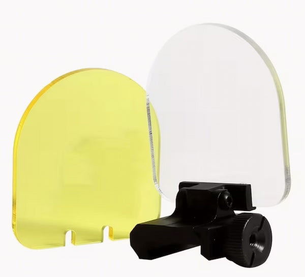 Yellow and clear visors with a black mounting bracket on a white background