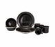 Black ceramic dinnerware set on a white background