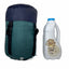 Green and navy backpack next to a white milk jug with a cartoon cow label on a white background