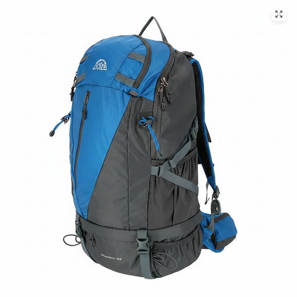 A blue and dark gray technical hiking backpack with multiple zippered compartments, compression straps, and a small blue pouch attached to the side, shown on a plain white background.