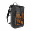 A black waterproof roll-top backpack with bright orange geometric accents on the front, a top carry handle, and a shoulder strap, shown on a plain white background.