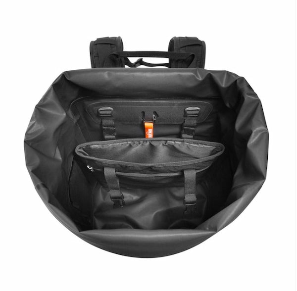 Black waterproof backpack shown from a top-down view, displaying its spacious main compartment, internal storage pockets, and padded shoulder straps against a solid white background.