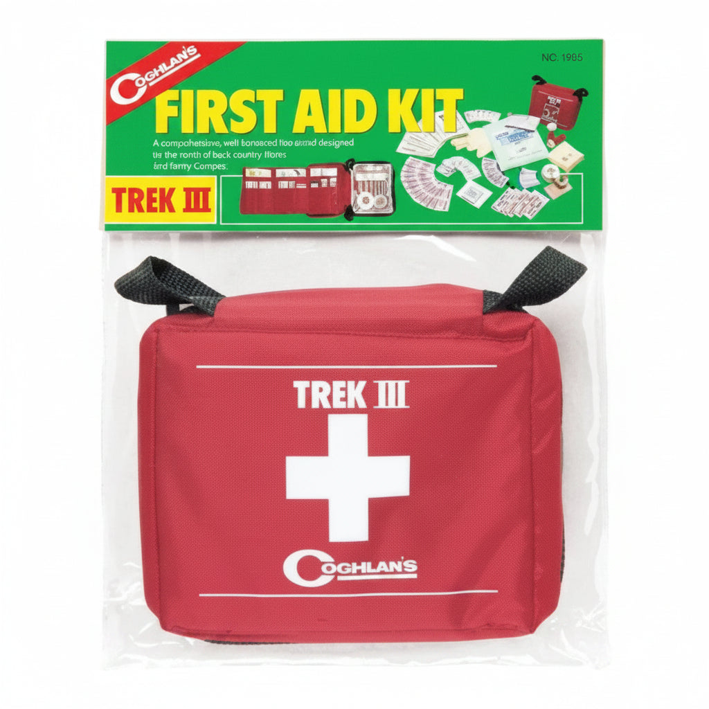Red first aid kit with green and yellow Coghlans branding on a white background