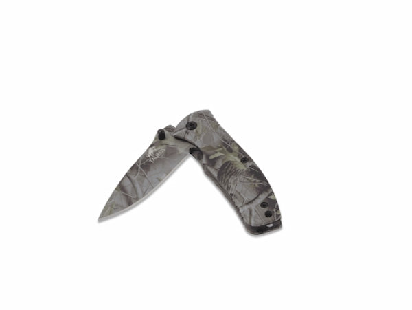 Folding knife with camouflage handle on a white background