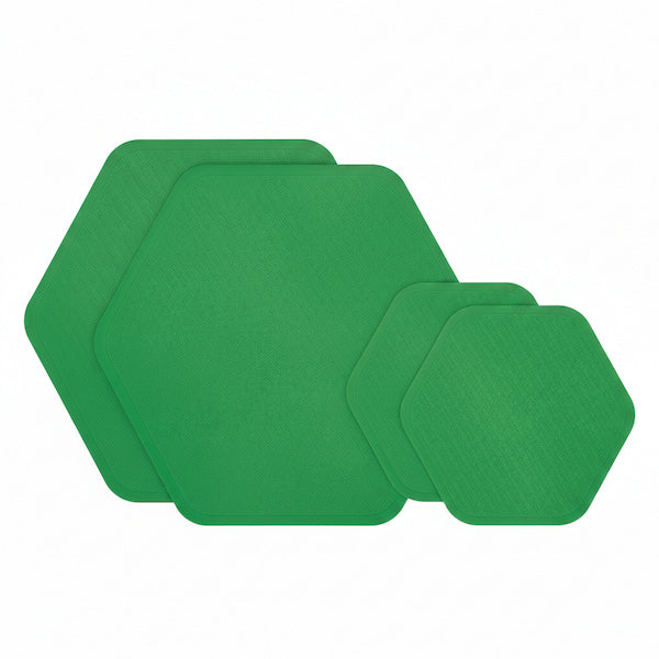Four green hexagonal coasters with rounded corners, displayed in a nested size arrangement on a plain white background.
