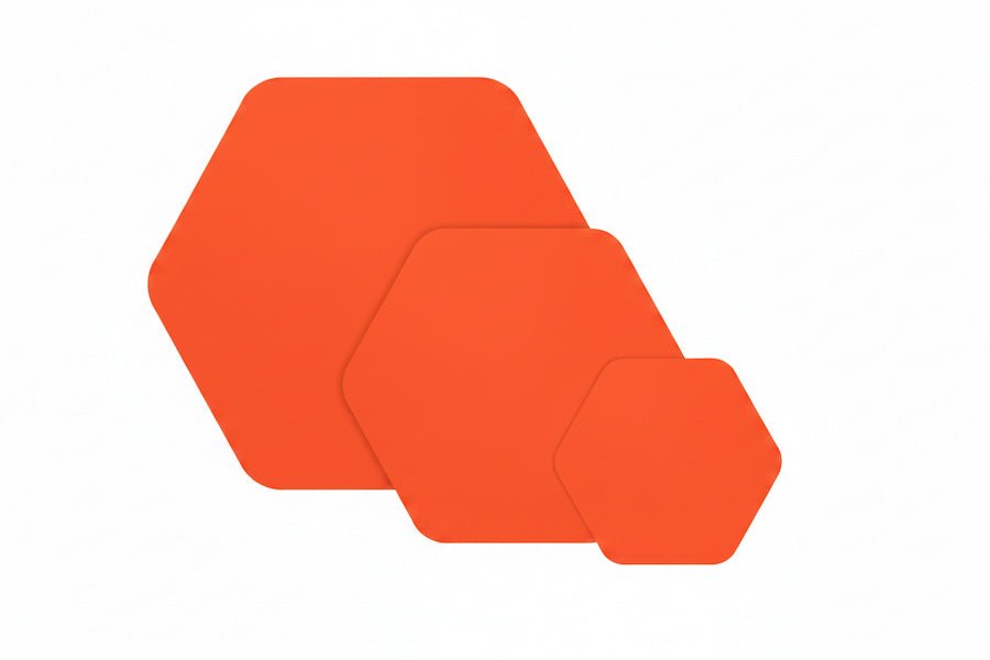 Three overlapping hexagonal shapes in shades of orange on a plain white background.