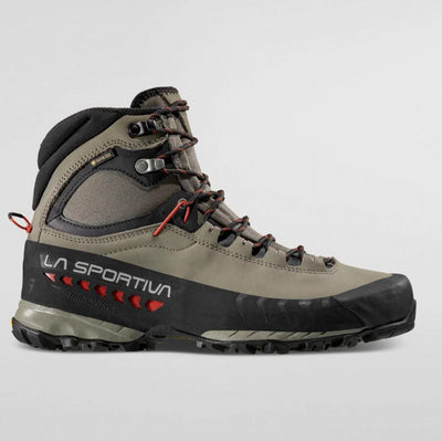 Hiking boot with La Sportiva branding on a gray background