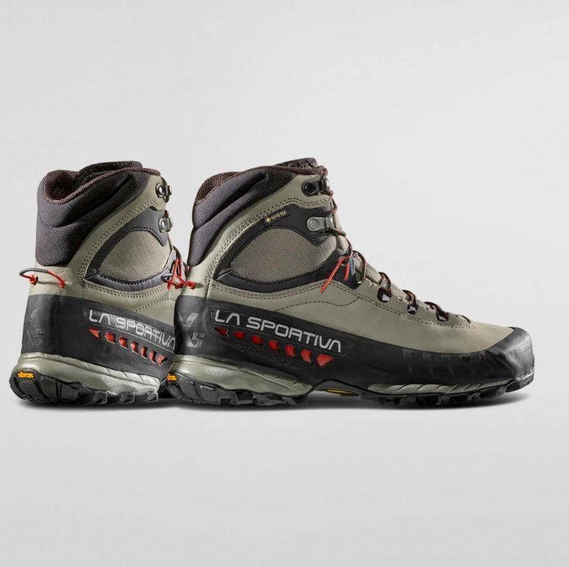 Pair of La Sportiva hiking boots on a light gray background