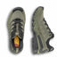 Green hiking shoes with black soles on a white background