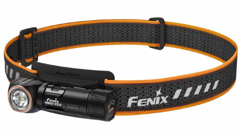 Fenix headlamp with a black and orange adjustable headband, shown on a plain white background.