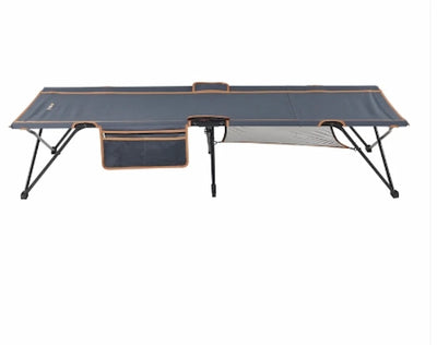 Portable folding bed with mesh design on a white background