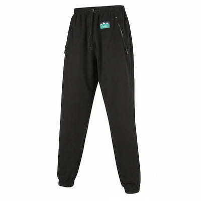 Black fleece jogger pants with an elastic drawstring waist, zippered side pockets, and a small green and white logo patch on the left hip.