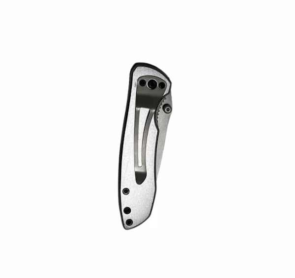 Folding knife blade on a white background