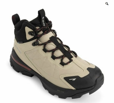 Beige and black hiking boot on a white background