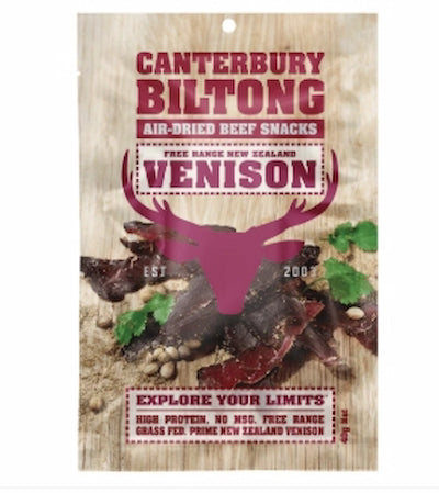 Canterbury Biltong Venison air-dried beef snacks packaging on a wooden background