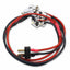 Electrical wiring with red and black cables on a white background