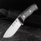 Knife with a wooden handle on a dark background